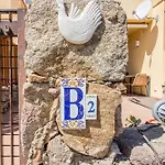 Appartement Guesthost - Bouganville Seaside Charm Flat W Veranda Portisco